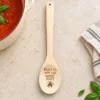 Bout to Stir Up Some Shit Engraved Wooden Spoon, on a limestone kitchen tabletop