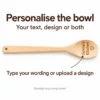 Custom wooden spoon bowl with example Emma’s Kitchen text and heart design oriented to read upright when held handle-up.