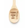 Spooning Can Lead to Forking Which Is Knife engraved wooden spoon, close-up of the engraved bowl on a white background